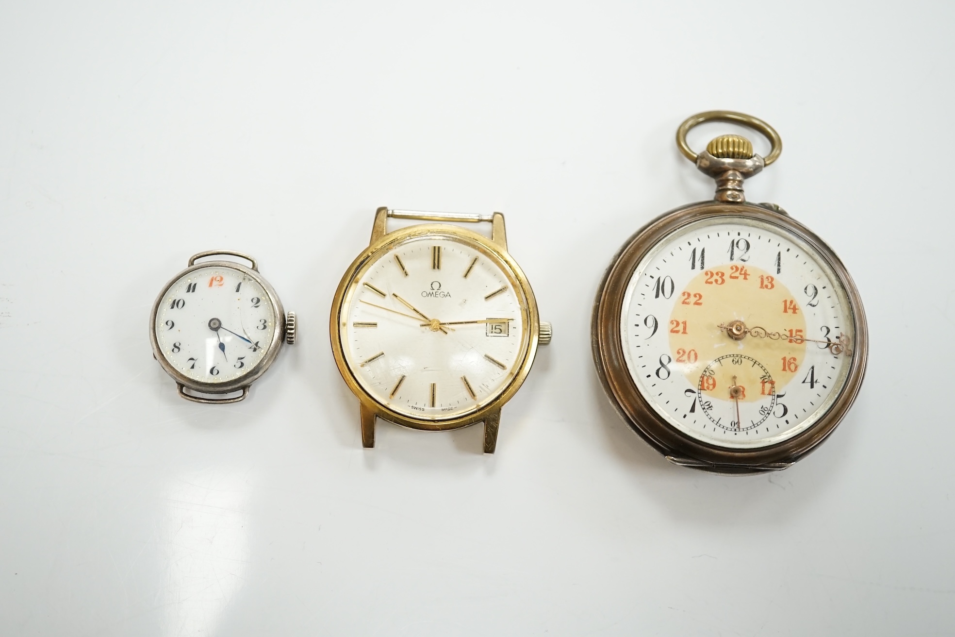 A gentleman's steel and gold plated Omega manual wind wrist watch, no strap, case diameter 35mm, together with a lady's silver wrist watch and a pocket watch. Condition - varies